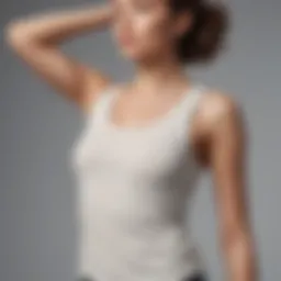 Elegant drop armhole tank top displayed on a minimalistic background